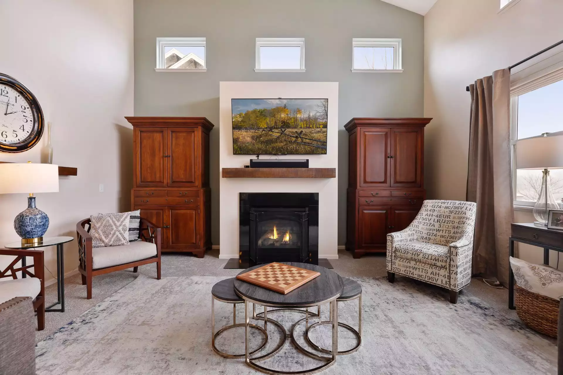 Woodbury Home For Sale Fireplace Media Wall with Windows Above