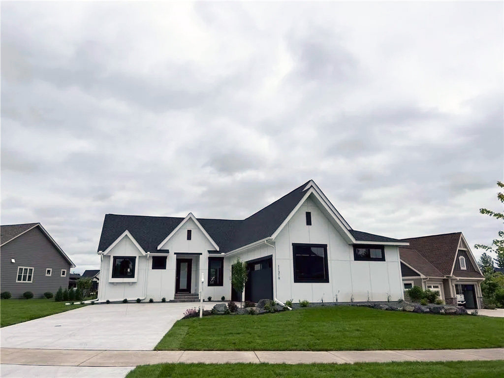 Triple car side load garage