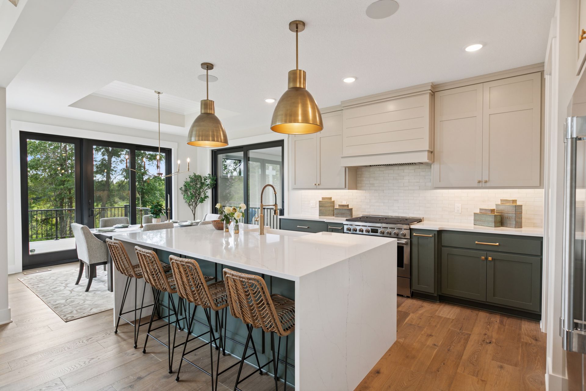 Gourmet kitchen with rich wood floors and high-end finishes