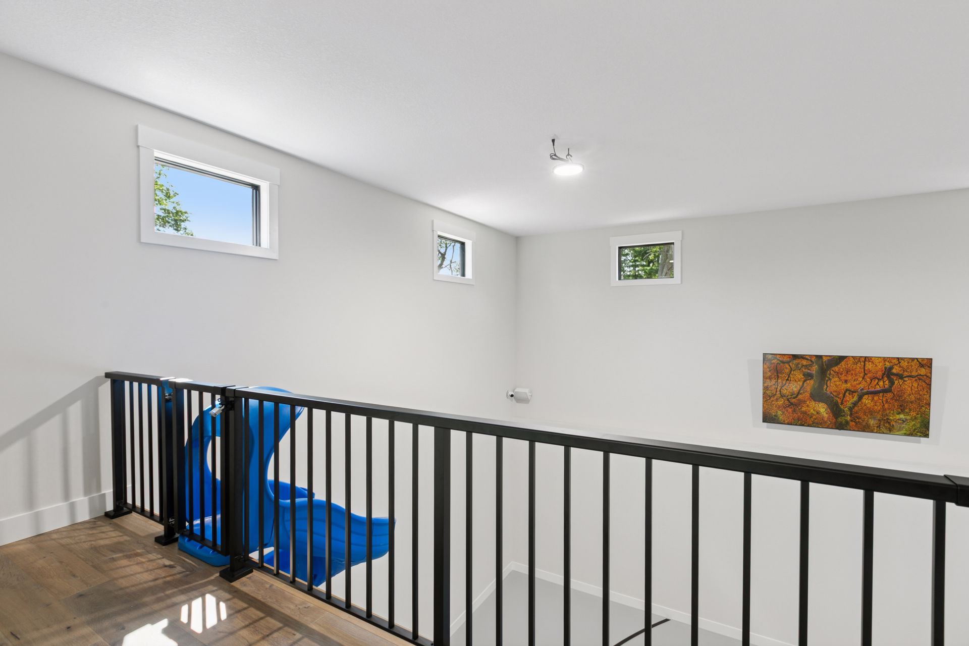 Piano windows add natural light for Indoor Sports Room™