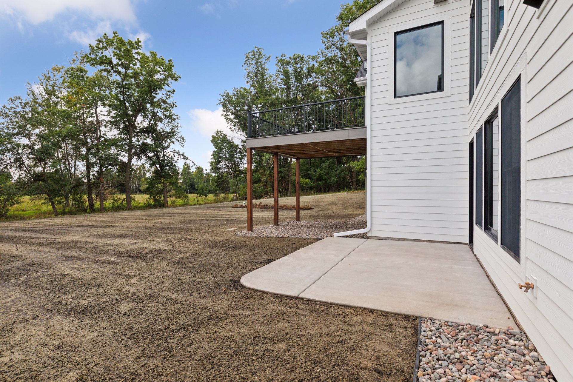 Large concrete patio designed for outdoor living and entertaining