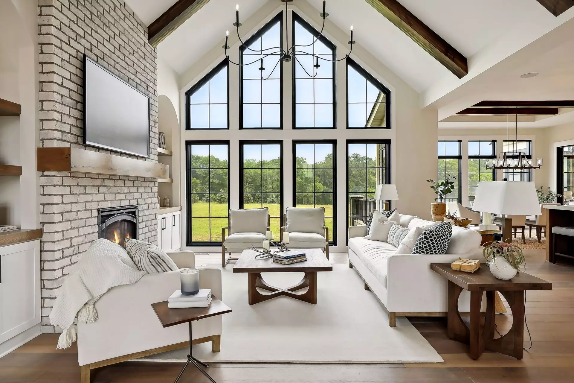Floor to peak windows in vaulted great room to take in the view