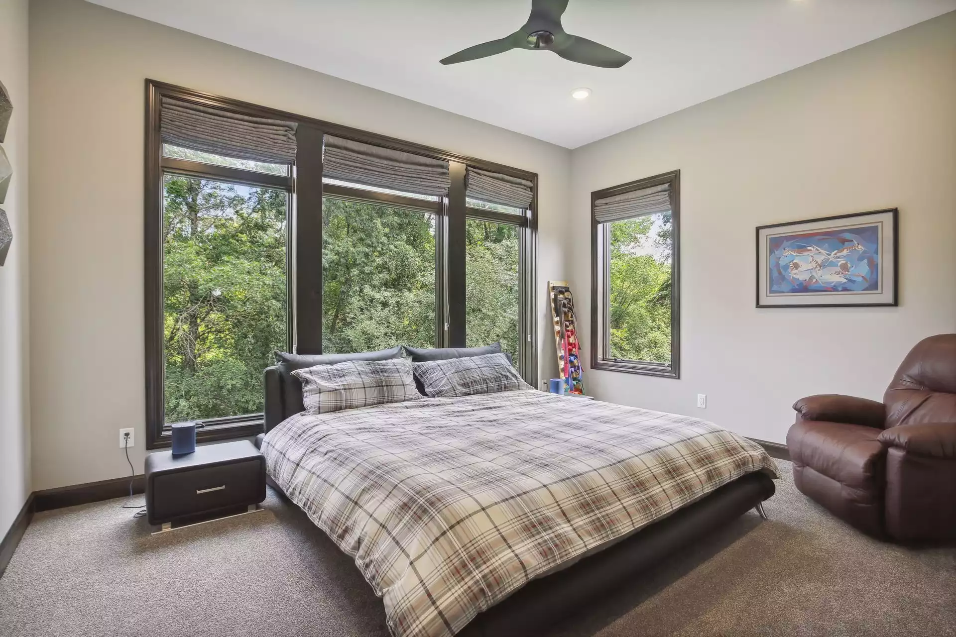 Bedroom features extra tall windows for great views